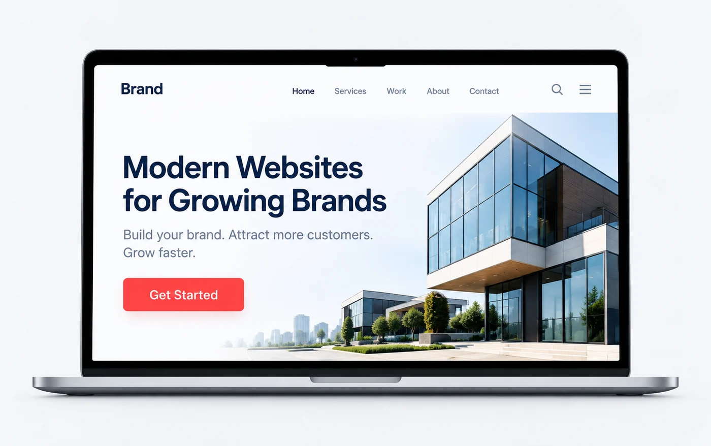 A business website homepage shown on a laptop