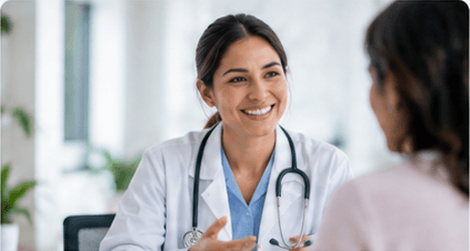 A doctor talking with a patient in a consulting room